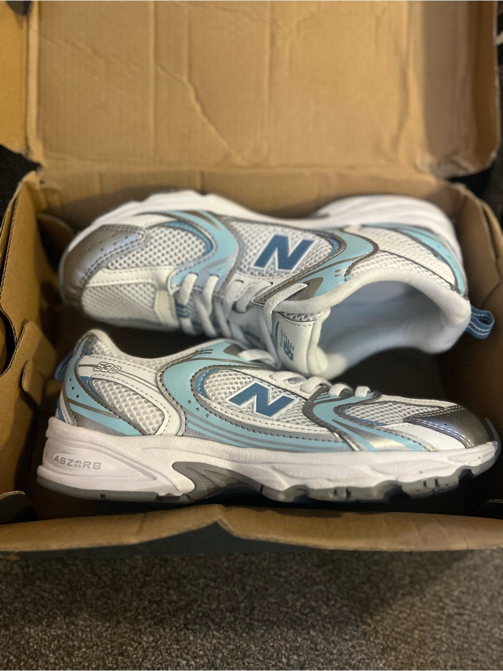 No lace New Balance Kids Light Blue & White Running Sneakers
